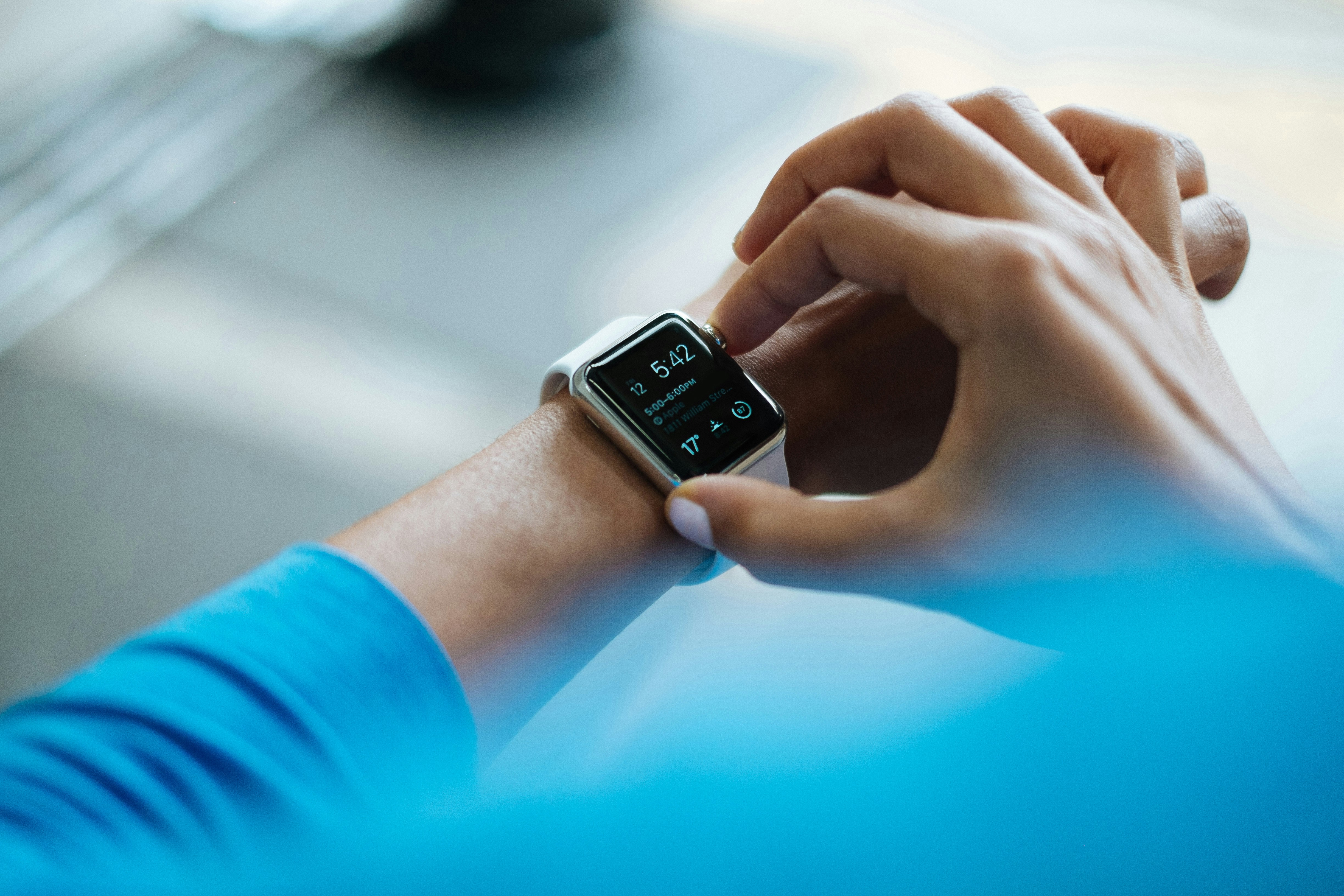 Person using a smartwatch for digital health support